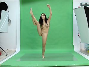 yam-sized tits Nicole on the green screen stretching