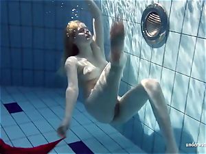red-hot blonde Lucie French nubile in the pool